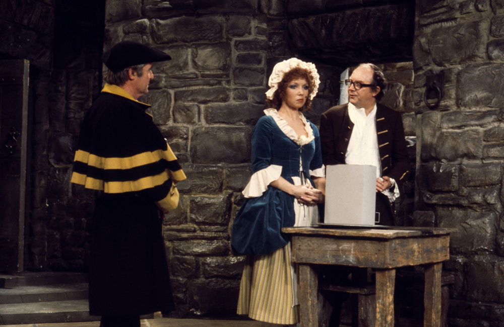 Ernie Wise as a coachman, Dilys Watling as a serving girl and Eric Morecambe as Dick Turpin, 07/01/1976. Copyright: BBC History