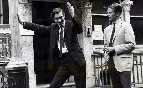 Peter Cook and Nicholas Luard pictured outside 18 Greek Street. Image shows left to right: Peter Cook, Nicholas Luard