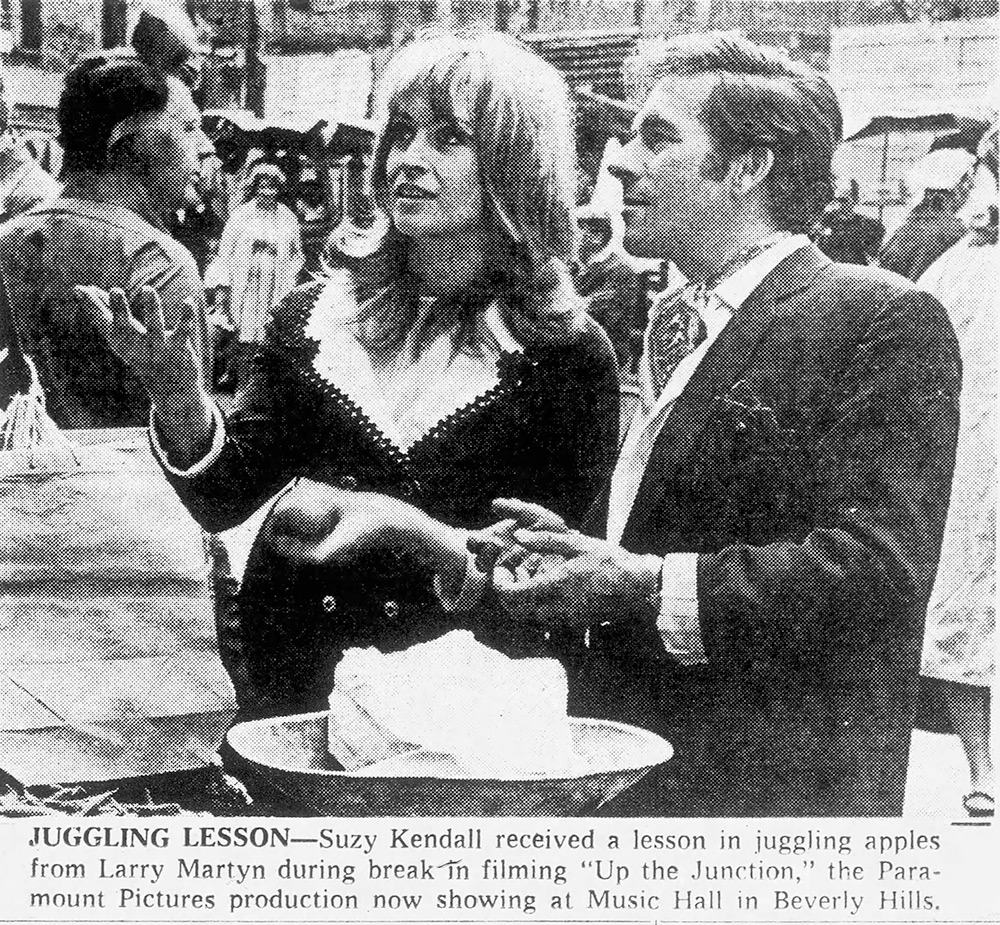 Suzy Kendall received a lesson in juggling apples from Larry Martyn during a break in filming Up The Junction. Image shows left to right: Suzy Kendall, Larry Martyn Suzy Kendall received a lesson in juggling apples from Larry Martyn during a break in filming Up The Junction. Image shows left to right: Suzy Kendall, Larry Martyn