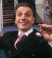 Filthy Rich & Catflap. Richie Rich (Rik Mayall). Copyright: BBC