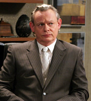 Reggie Perrin. Reggie Perrin (Martin Clunes). Copyright: Objective Productions