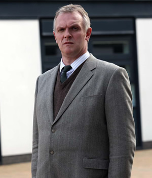 The Inbetweeners. Mr Gilbert (Greg Davies). Copyright: Bwark Productions