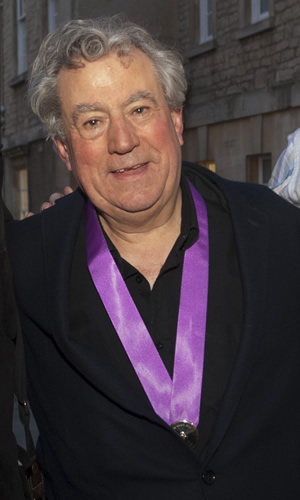 Terry Jones wearing his Bath Plug Award at the Bath Comedy Festival. Terry Jones