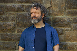 Staged. Michael (Michael Sheen)