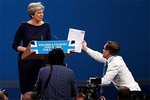 Image shows from L to R: Theresa May, Simon Brodkin