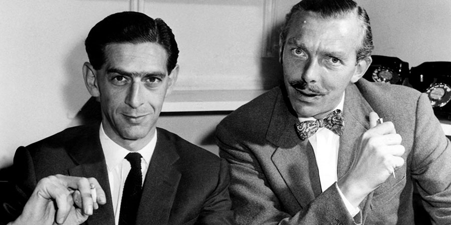 Image shows from L to R: Denis Norden, Frank Muir. Copyright: BBC