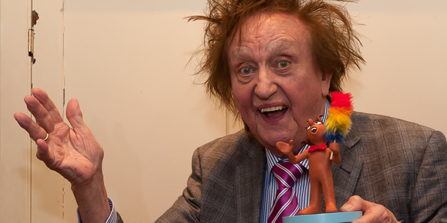 Ken Dodd receiving the Aardman Slapstick Comedy Legend Award. Ken Dodd