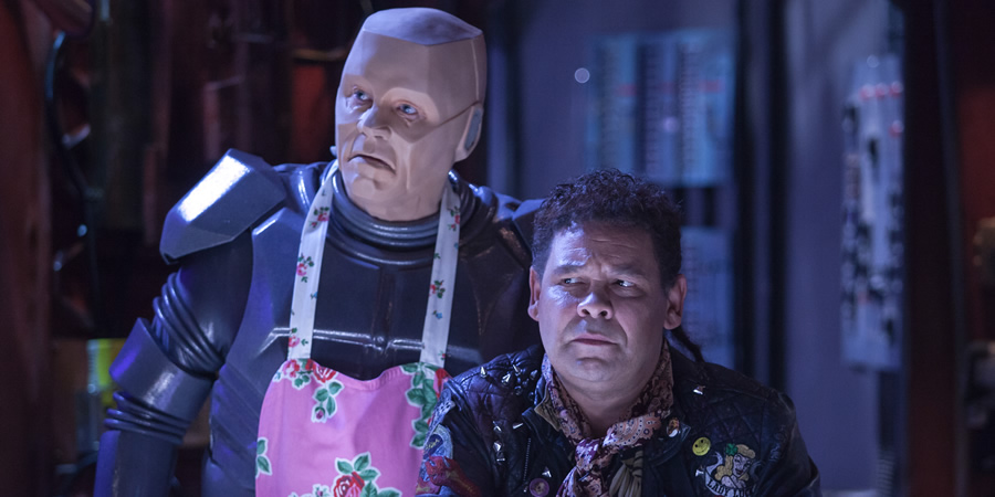 Red Dwarf. Image shows from L to R: Kryten (Robert Llewellyn), Lister (Craig Charles)