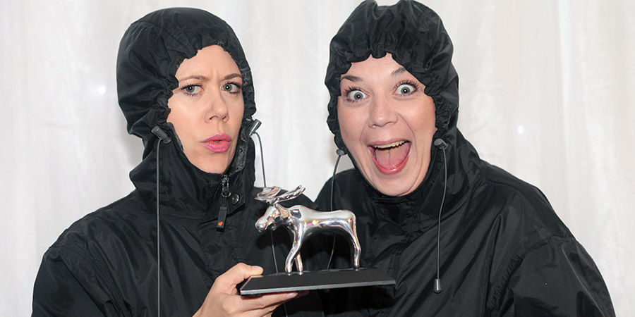 The Kagools with their Amused Moose Comedy Award trophy