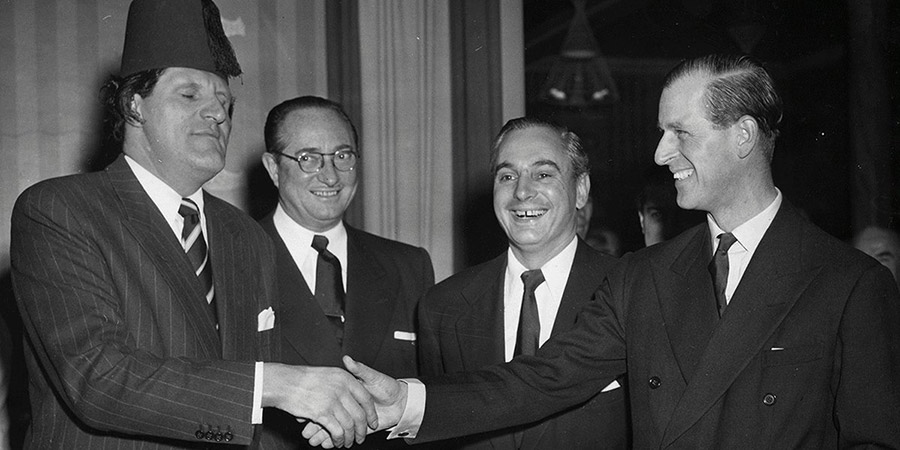 Tommy Cooper, film producers C.J. Latta and James Carreras, and the Duke of Edinburgh at a Variety Charity event. Copyright Variety