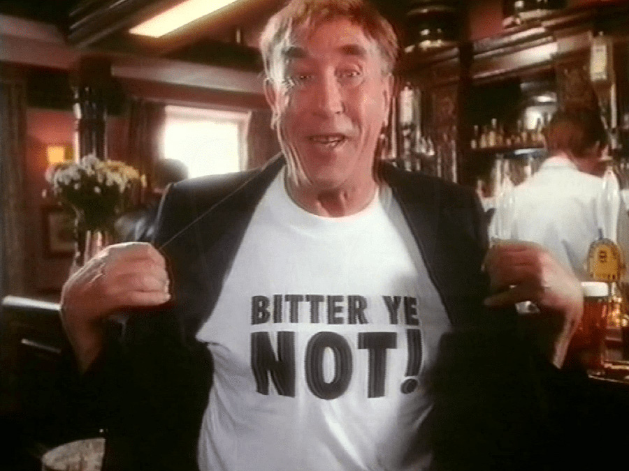 Frankie Howerd bearing a 'Bitter ye not!' t-shirt in a promotion for Boddington's bitter. Frankie Howerd