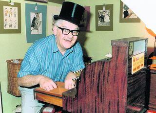 Ronnie Barker pictured at the till of his antiques shop. Ronnie Barker