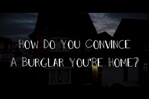 How do you convince a burglar you're home?